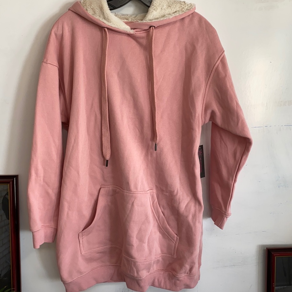 Lighter pink sweater with hoodie. Hoodie part of the sweater dress has faux fur